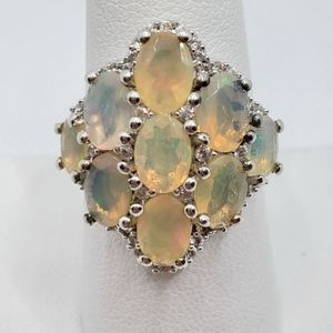 Faceted opal cluster ring